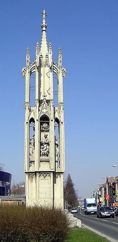 Spinnerin am Kreuz