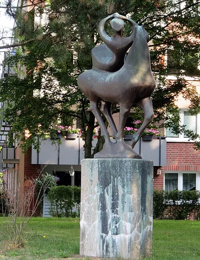 Akrobatin auf Pferd