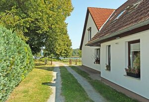 Ferienwohnung mit Sitzecke im Garten am Bodden in Ralswiek