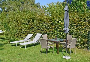 Ferienwohnung mit Sitzecke im Garten am Bodden in Ralswiek