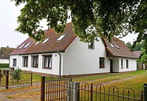 Ferienwohnung mit Sitzecke im Garten am Bodden in Ralswiek