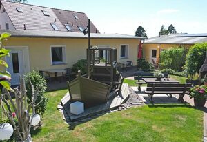 Ferienwohnungen mit Terrasse in Sellin zum Südstrand – Ferienhaus 01 mit Kamin und Terrasse