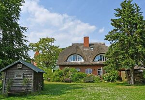Ferienwohnungen im Landhaus am Deich mit großem Garten – Nr. 3 Appartement mit Kamin