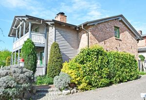 Ferienwohnungen mit Kamin und Blick zum Selliner Seepark – Ferienwohnung mit Balkon und Kamin Donnerkeil