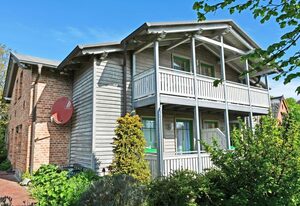 Ferienwohnungen mit Kamin und Blick zum Selliner Seepark – Ferienwohnung mit Balkon und Kamin Donnerkeil