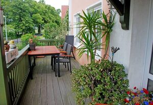 Appartementhaus zur Brücke direkt am See – Ferienappartement Pusteblume mit Terrasse