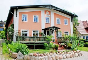 Appartementhaus zur Brücke direkt am See – Ferienappartement Pusteblume mit Terrasse