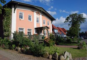 Appartementhaus zur Brücke direkt am See – Ferienappartement Pusteblume mit Terrasse