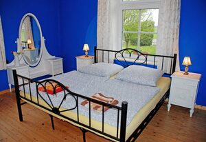 Ferienwohnungen im Gutshaus Gnies – 03 Ferienwohnung Rügen mit Kamin