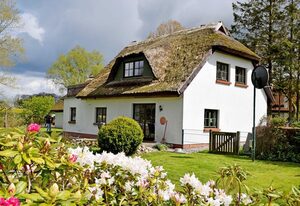 Ferienhaus und -wohnung unterm Reetdach in Woorke – Ferienhaus unterm Reetdach in Woorke