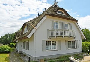 Landhaus mit Reetdach am Teich – Ferienwohnung mit Balkon 0G 2