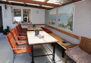 Ferienwohnungen an der Hagenschen Wiek auf Rügen – Ferienwohnung Rügen mit Seeblick und Sonnenbalkon