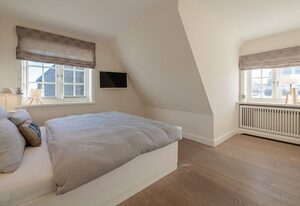 Finn's Hüs – Stilvolles Reetdachhaus in Wenningstedt auf Sylt.