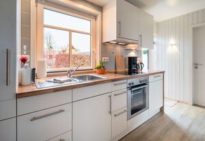 Ferienhaus Kai mit Garten - Deichhelden Nordstrand
