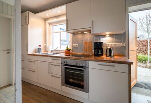 Ferienhaus Kai mit Garten - Deichhelden Nordstrand