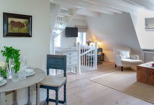 Deichgraf 2 – Charmante Galeriewohnung im Herzen von Kampen für Paare und kleine Familien