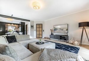 Dünen Lodge – Moderne Erdgeschosswohnung mit großzügiger Terrasse und eigenem Garten
