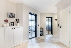 Dünen Lodge – Moderne Erdgeschosswohnung mit großzügiger Terrasse und eigenem Garten