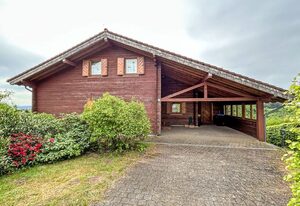 Blockhaus Kronenberg – Ferienwohnung Gartentraum .1