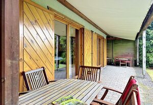 Blockhaus Kronenberg – Ferienwohnung Gartentraum .1