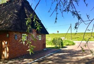 Reetdachhaus für erholsamen Familienurlaub