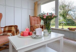 Ferienwohnung Charlie – Idyllische Erdgeschosswohnung mit Garten in zentraler Lage von Wenningstedt