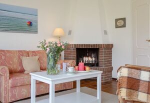 Ferienwohnung Charlie – Idyllische Erdgeschosswohnung mit Garten in zentraler Lage von Wenningstedt