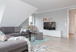 Bäum Hüs B – Ferienwohnung mit Südbalkon bietet bis zu 5 Personen Platz in Strandnähe.