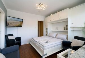 Strandgeflüster – Gemütliches und strandnahes App. mit Westbalkon, PKW-Stellplatz, WLAN.