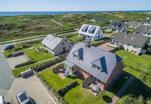 Am Sandwall-Westseite – Strandnahe Doppelhaushälfte für 4 Personen: Terrasse, Garten, Stellplatz, WLAN.
