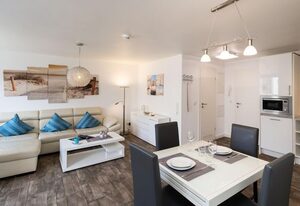 Sylter Residenz – Modernes App., strandnah mit Balkon, PKW-Stellplatz, WLAN. Haustiere erlaubt.