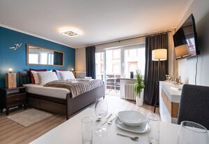 Meerliebe – Schönes 1-Zimmer App., strandnah mit Meerblick, Balkon, WLAN. Haustiere erlaubt.