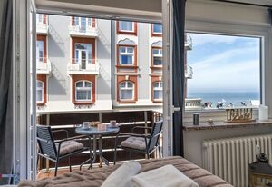 Meerliebe – Schönes 1-Zimmer App., strandnah mit Meerblick, Balkon, WLAN. Haustiere erlaubt.
