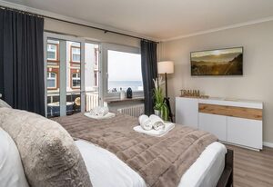 Meerliebe – Schönes 1-Zimmer App., strandnah mit Meerblick, Balkon, WLAN. Haustiere erlaubt.
