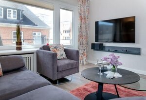 Sundowner – Moderne 2-Zimmerwohnung mit Stellplatz am Strand
