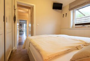 Haus Sonnenstrahl, Strandhaus – Schöne 3-Zimmer-Ferienwohnung im Erdgeschoss auf ca. 54 m² für bis zu 4 Personen
