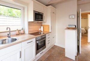 Haus Sonnenstrahl, Strandhaus – Schöne 3-Zimmer-Ferienwohnung im Erdgeschoss auf ca. 54 m² für bis zu 4 Personen