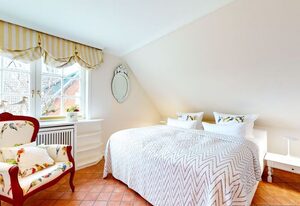 Lee Biberhüs – Gemütliche Wohnung unter Reet im Landhausstil im traditionellen Archsum.