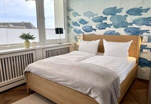 Boje – Modernes und zentrales App. mit Balkon, PKW-Stellplatz, WLAN. Haustiere erlaubt.