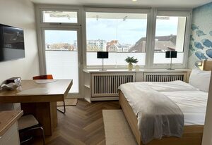 Boje – Modernes und zentrales App. mit Balkon, PKW-Stellplatz, WLAN. Haustiere erlaubt.