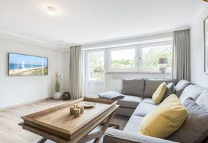 Haus Weissenburg Whg. Garten Ost – Moderne, strandnahe 3-Zimmer-Ferienwohnung auf ca. 80 m² für bis zu 3 Personen