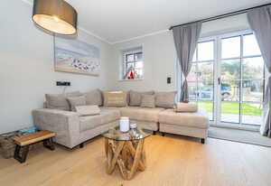 Haus Rosi – Ferienhaushälfte in Westerland mit Sauna und Garten. Haustiere sind Willkommen.