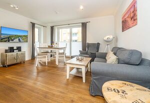 On the Beach – Moderne Ferienwohnung für 2 Personen mit Balkon und Stellplatz direkt am Strand