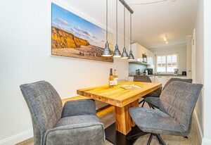 Haus Strandoase 2 – Ferienhaushälfte für bis zu 6 Personen mit Terrasse und Sauna.