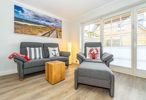 Haus Strandoase 2 – Ferienhaushälfte für bis zu 6 Personen mit Terrasse und Sauna.