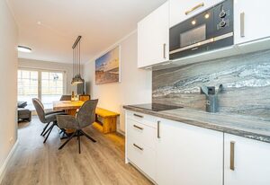 Haus Strandoase 2 – Ferienhaushälfte für bis zu 6 Personen mit Terrasse und Sauna.