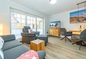Haus Strandoase 2 – Ferienhaushälfte für bis zu 6 Personen mit Terrasse und Sauna.