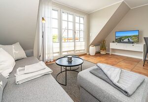 Strandpirat – Stilvolle Ferienwohnung für bis zu 4 Personen mit Balkon.