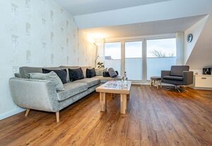 Sommerwind – Ferienwohnung in Wenningstedt für bis zu 4 Personen, mit Balkon.