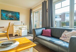 Haus Charlotte – Mittel-Ferienhausteil für max. 4 Personen mit Garten - nur 350m bis zum Strand.